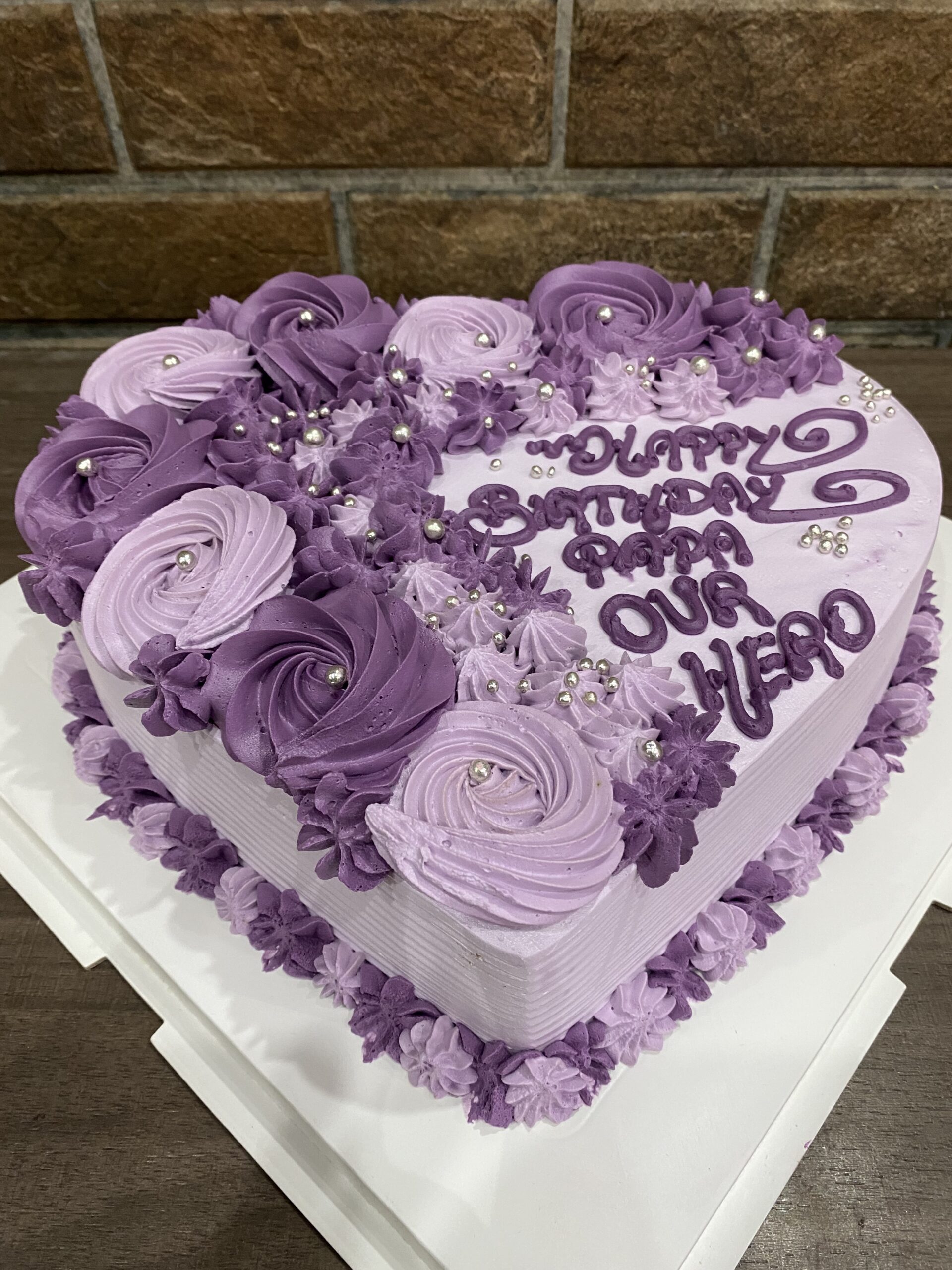 Pretty cake decorating designs we've bookmarked : 1st birthday soft purple  cake