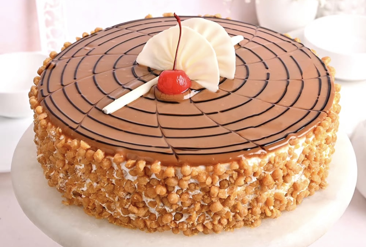 Butterscotch Cake Half Kg and 10 Red Rose Bunch - Tasty Treat Cakes