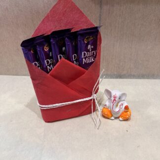 Small Ganesha Idol With Chocolates