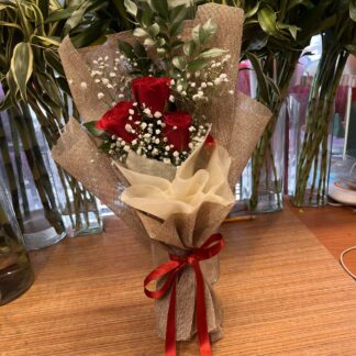 Premium Red Roses In Jute-By PGA