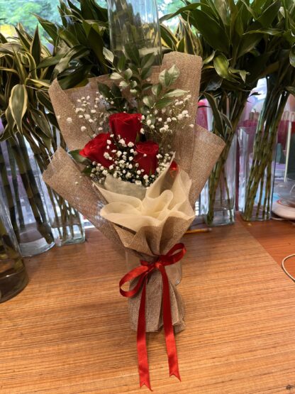 Premium Red Roses In Jute-By PGA