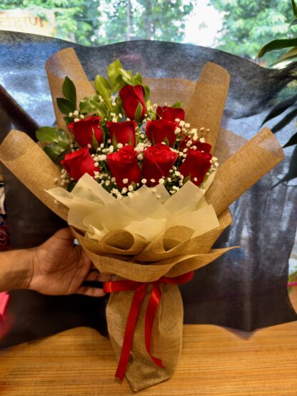 Premium Red Roses In Brown Jute