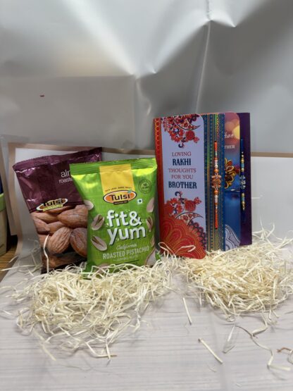 Set Of Two Rakhi With Roasted Nuts