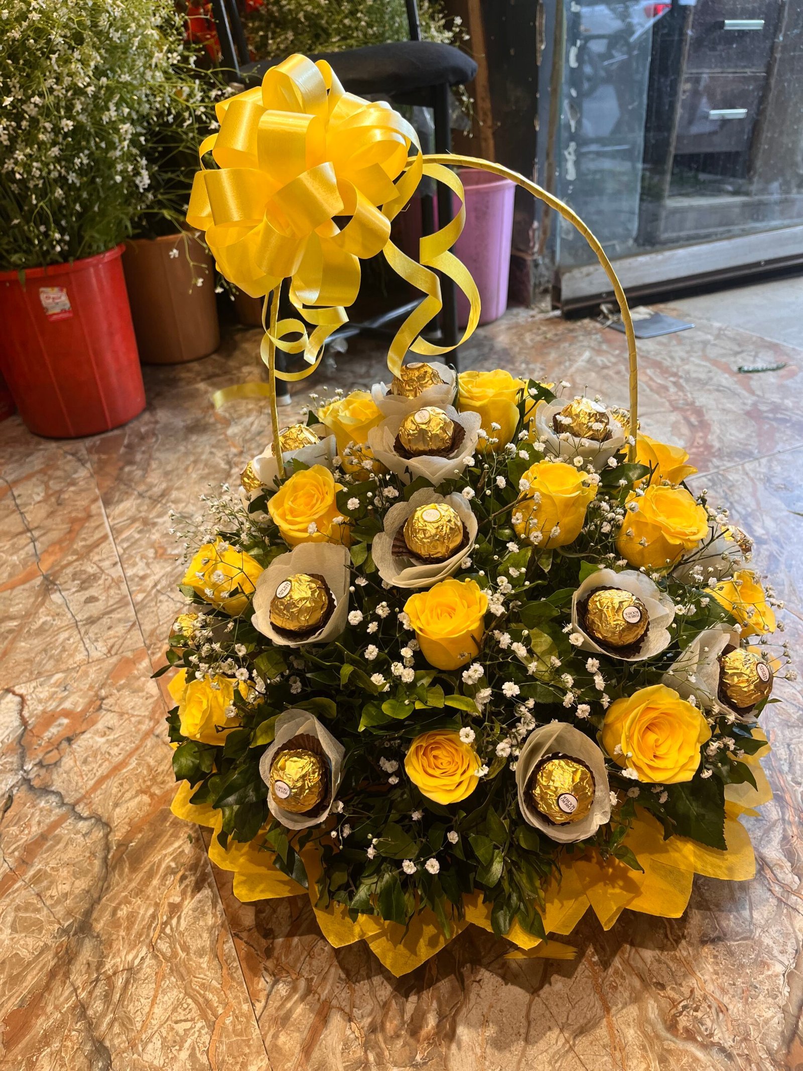 Ferrero Rocher N Yellow Roses Basket Arrangement