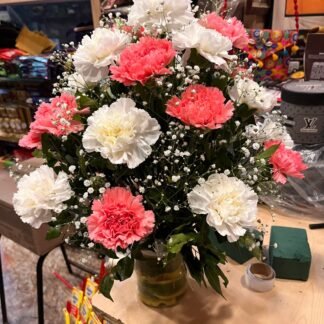 Carnations Arrangement In Glass Vase