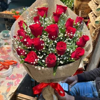 Red Roses in Jute Packing-By PGA