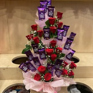 Dairy milk & Roses Basket Arrangement-By PGA