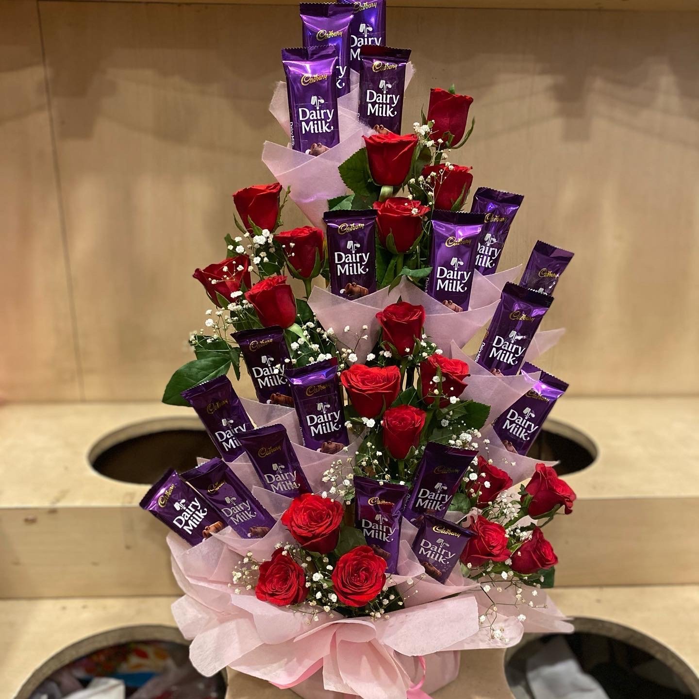 Dairy milk & Roses Basket Arrangement-By PGA