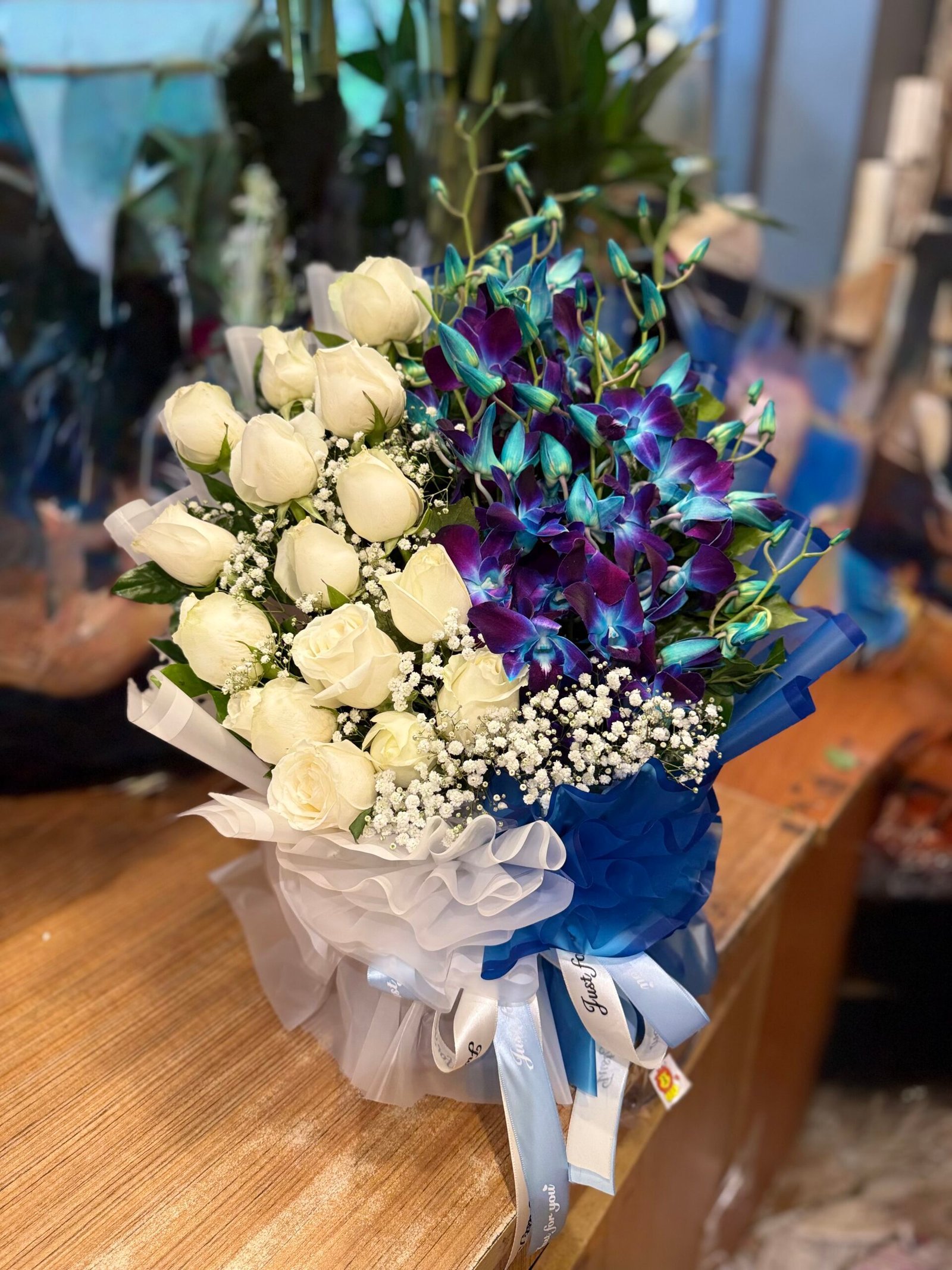 Blue Orchids & White Roses Premium Arrangement