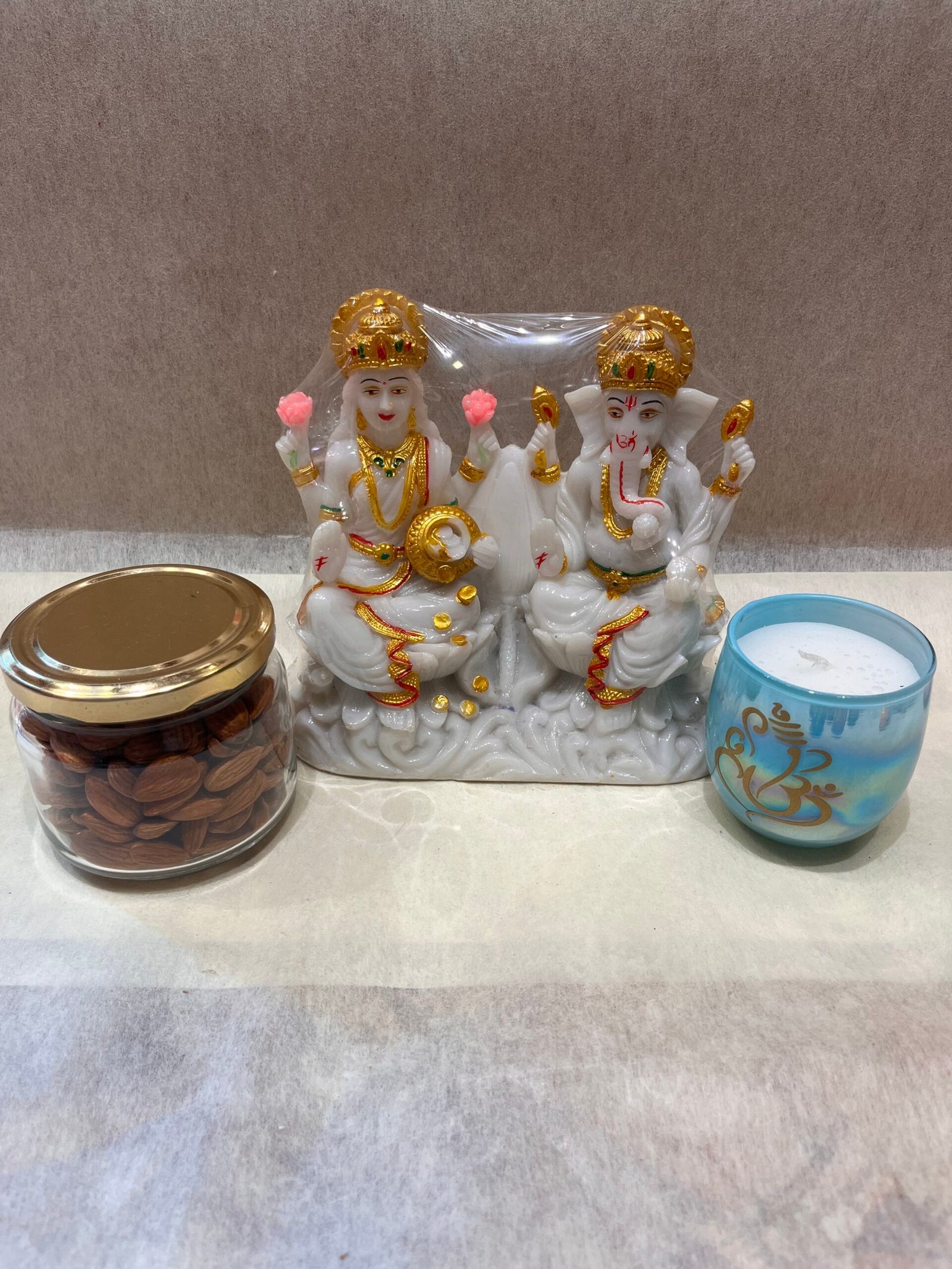 Laxmi Ganesh Ji Idol Dry Fruits n Candle