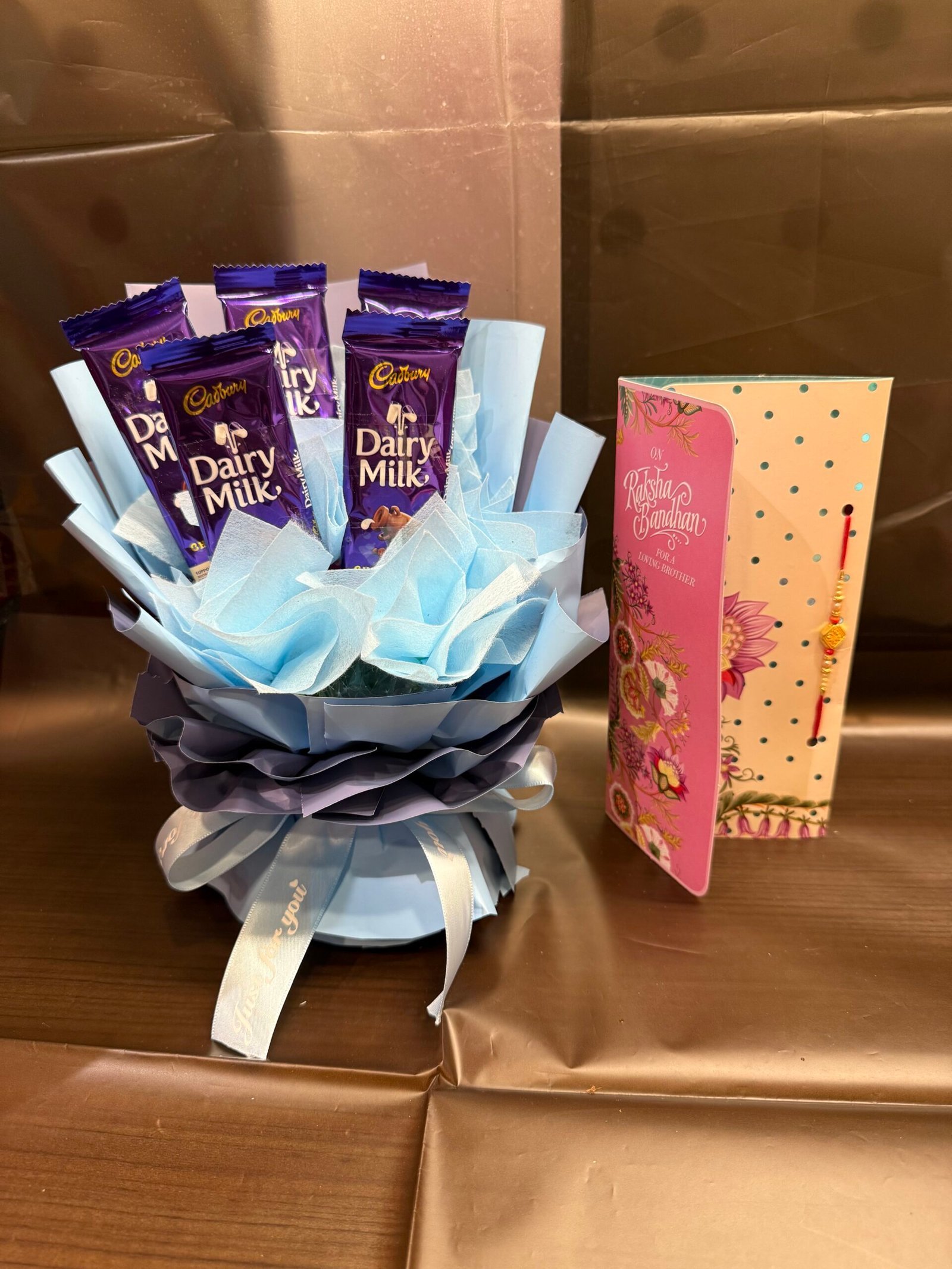 Single Rakhi With Dairy-milk Bouquet
