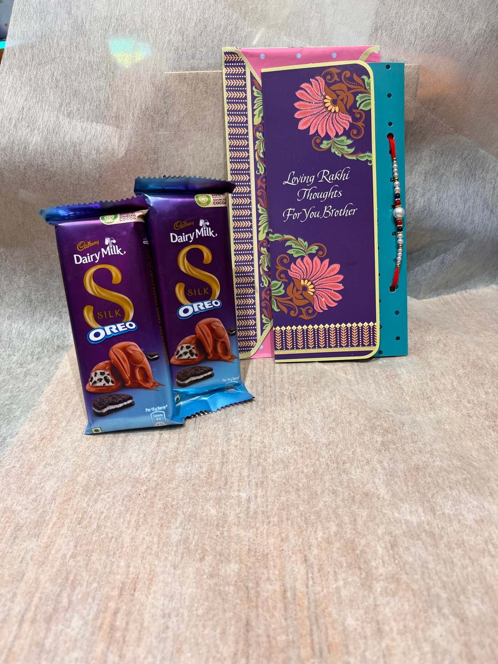 Single Moti Rakhi With Oreo Silk