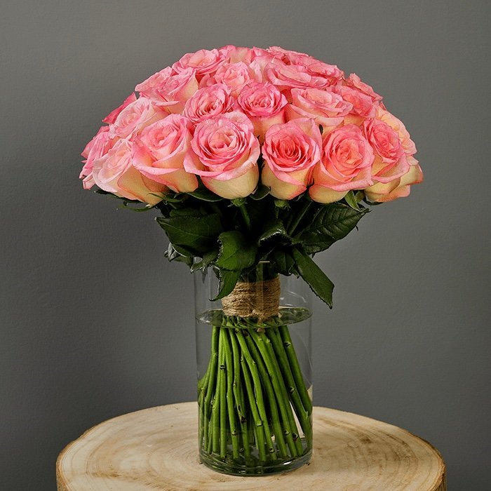 Elegant Pink Roses In Glass Vase